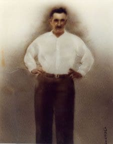 A photo of a man in a white shirt and pants.