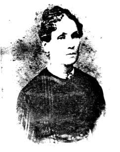 A black and white photo of a woman.