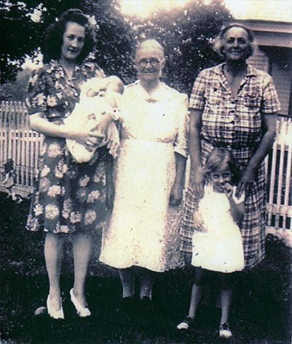 A group of women standing next to each other.