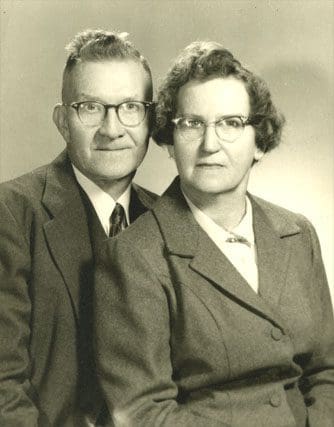 A man and woman standing side by side.