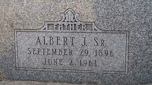 A close up of the grave marker for albert j. Sr