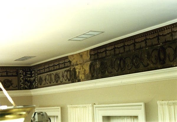 A ceiling with some carvings on it