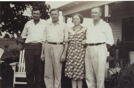 A group of people standing next to each other.