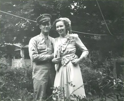 A man and woman standing next to each other.