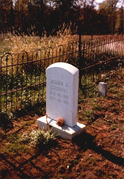 A white grave in the middle of nowhere.