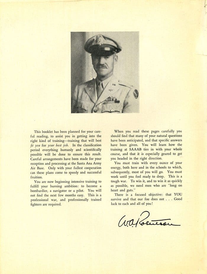 A page of an old book with a picture and signature.