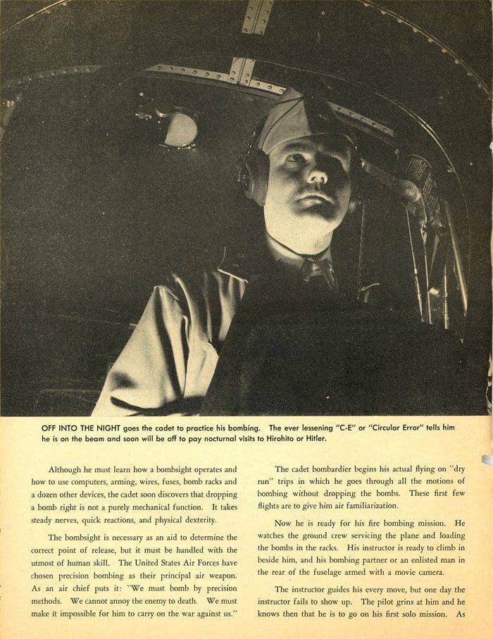 A man in the driver 's seat of an automobile.