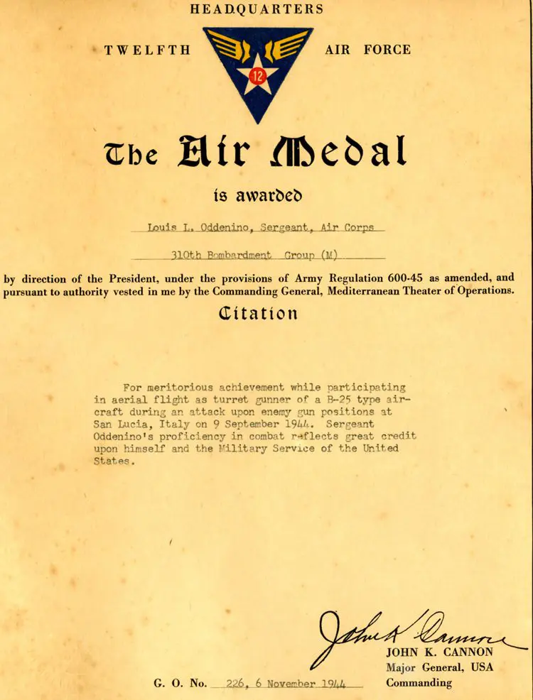 A certificate of recognition for the air medal.