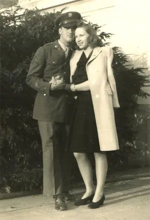 A man and woman standing next to each other.