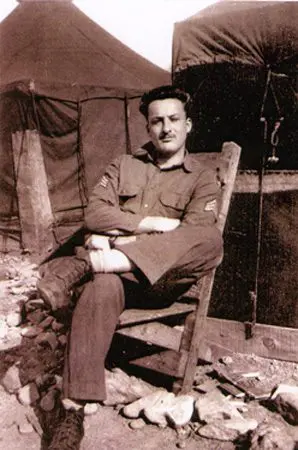 A man sitting in a chair wearing uniform.