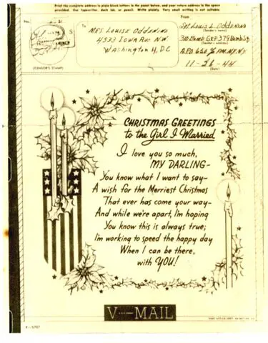 A christmas card with candles and the words " christmas greetings to my husband ".