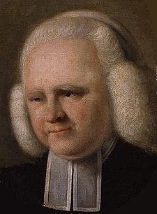 A painting of a man with white hair and beard.