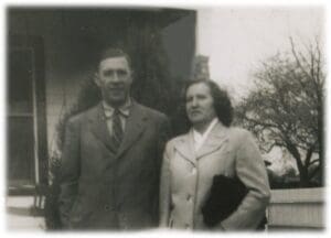 A man and woman standing next to each other.