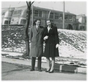 A man and woman standing next to each other.