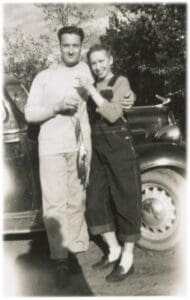 A man and woman standing next to each other.