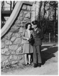 A man and woman standing next to each other.